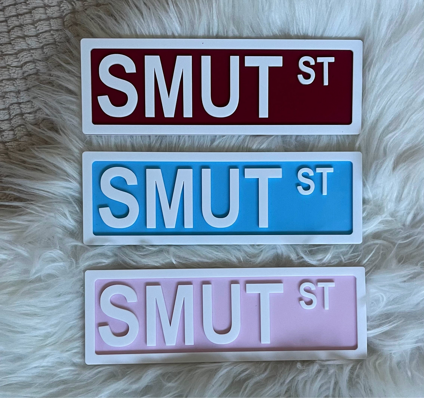 SMUT ST SHELF SIGN
