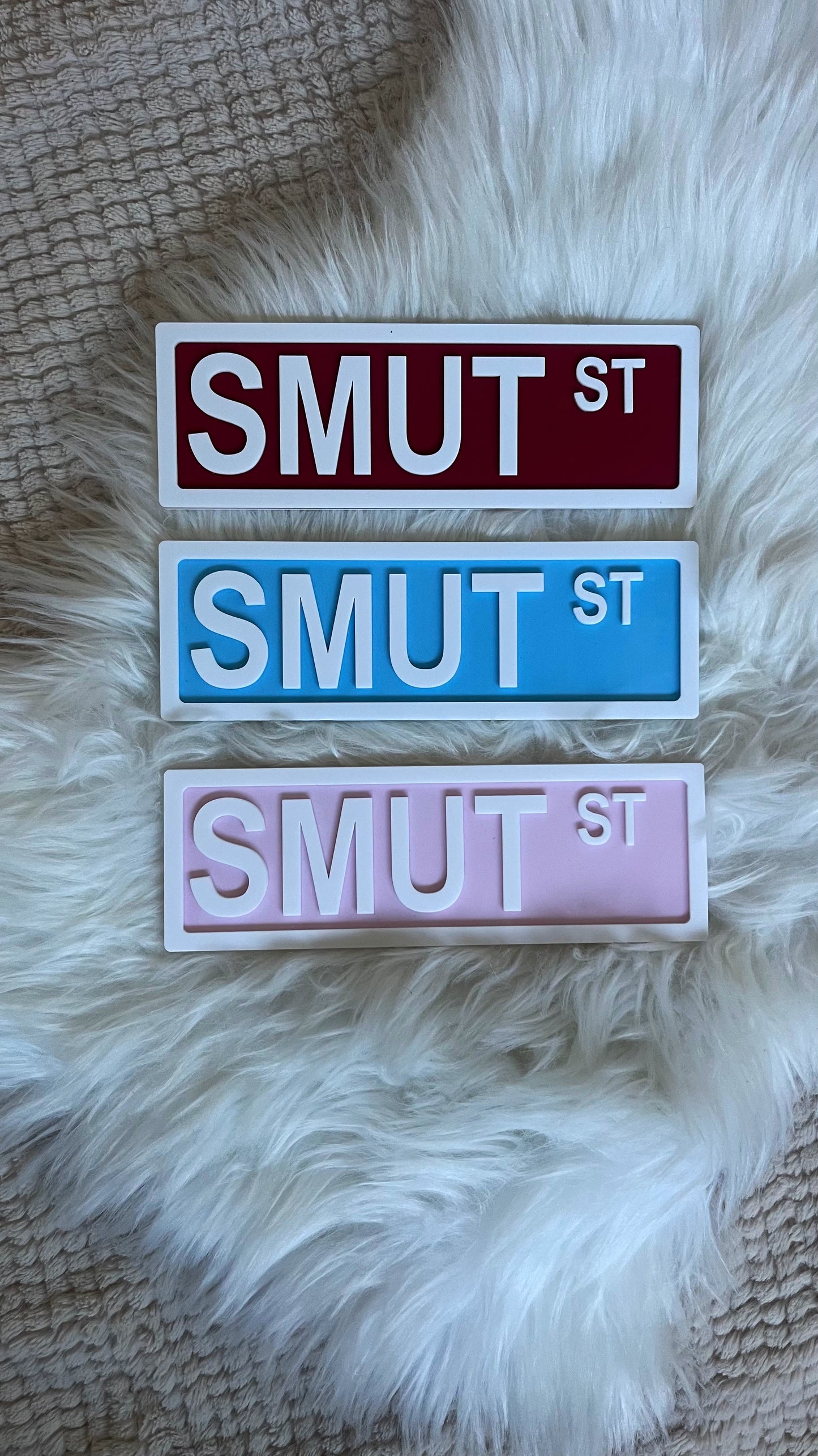 SMUT ST SHELF SIGN