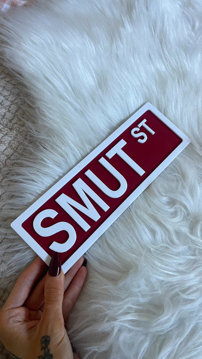 SMUT ST SHELF SIGN